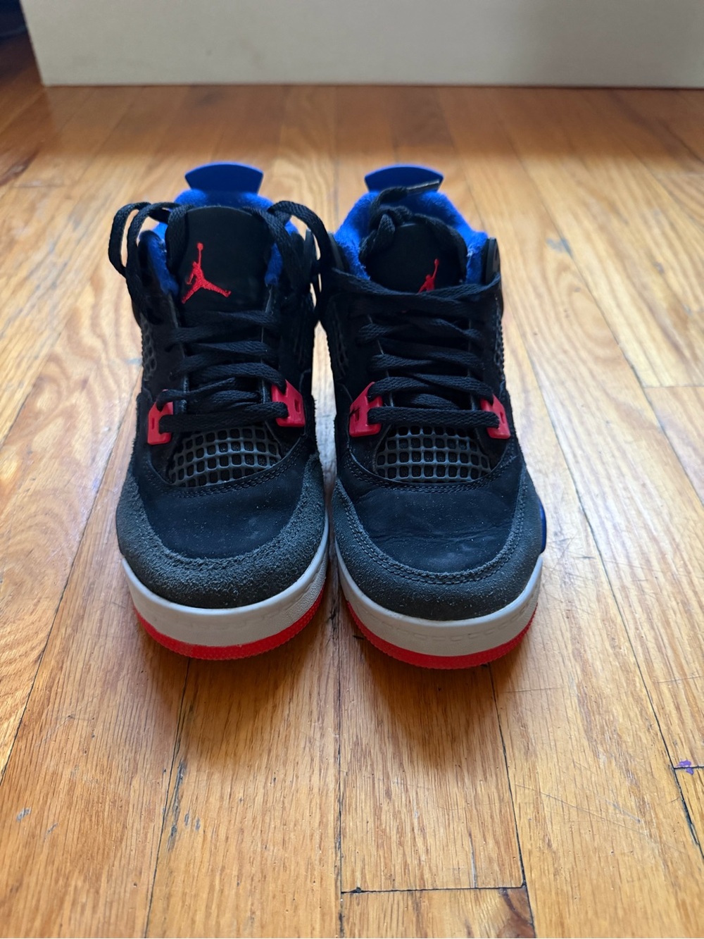 Jordan Kids Black Sneakers with Red and Blue Accents